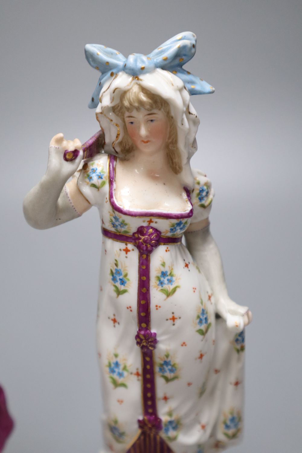 A pair of KPM Berlin porcelain figures of a maiden and a gallant, height 22cm